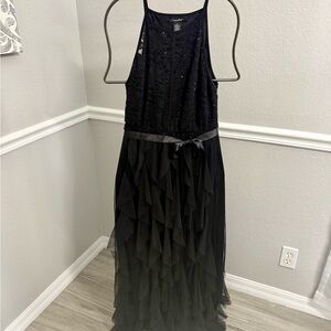 Elegant Black Sleeveless Halter Dress with Ruffle Skirt